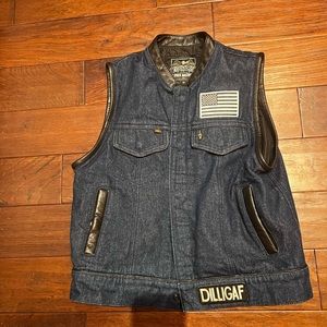 Espinozas medium blue denim vest.